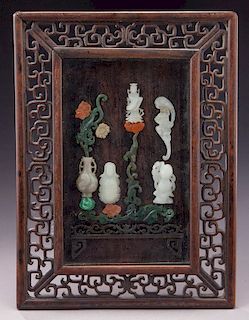 Chinese Qing jade plaque inlaid in a rosewood