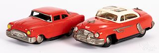 Two Japanese tin friction battery operated cars