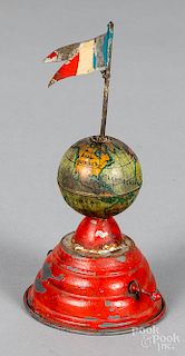 Painted and lithograph tin world globe steam toy