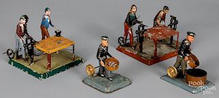 Four painted tin workmen steam toy accessories