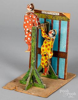 Paper litho over wood clown acrobat steam toy