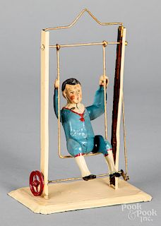 Painted tin boy in swing steam toy accessory