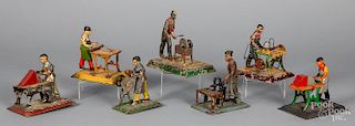 Seven painted tin workmen steam toy accessories