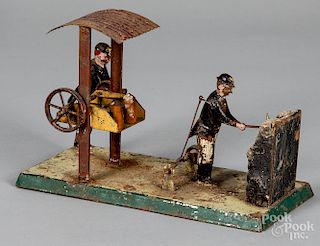 Becker painted tin miner steam toy accessory