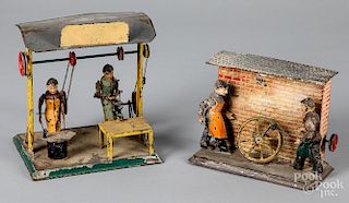 Two painted tin workshop steam toy accessories