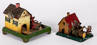 Two Doll painted tin mill steam toy accessories