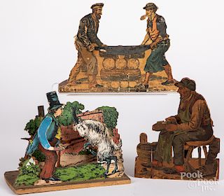 Three paper lithograph over wood steam toys