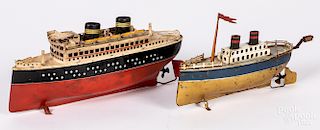 Two Arnold tin wind-up ocean liner boats