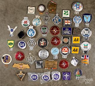 Large collection of car license badges