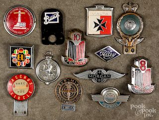 Collection of vintage license plate car badges