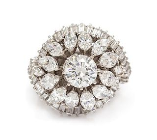 A Platinum and Diamond Bombe Ring, 11.80 dwts.