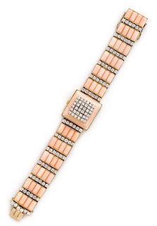 An 18 Karat Bicolor Gold, Diamond and Coral Wristwatch, Longines, 57.80 dwts.