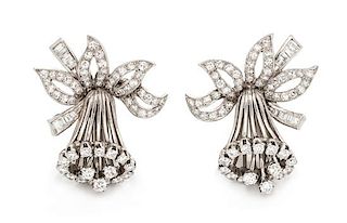 A Pair of Platinum and Diamond Daffodil Motif Earclips, 9.85 dwts.