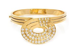 An 18 Karat Yellow Gold and Diamond Bangle Bracelet, 26.70 dwts.