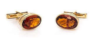 A Pair of Yellow Gold and Citrine Cufflinks, 7.65 dwts.