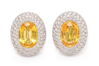 A Pair of 18 Karat White Gold, Yellow Sapphire and Diamond Earclips, Michele della Valle, 18.80 dwts.