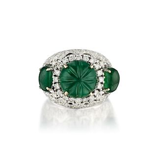 A Carved Emerald and Diamond Ring