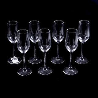 Juego de copas para champagne. Siglo XX. Elaboradas en cristal transparente. Diseño de la firma Riedel. Piezas: 7.