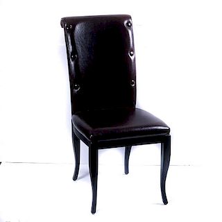 Smania, silla "Barbaltadue". Italia, años 2000. Estructura de madera ebonizada, respaldos con chapetones y asientos de piel café.