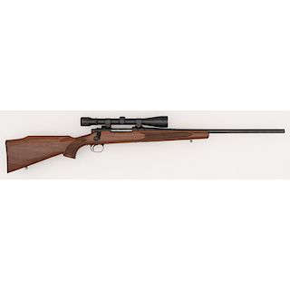 * Remington Model 700 Rifle With Weaver Scope
