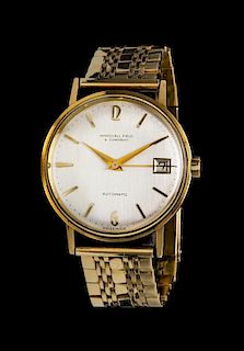 * A 14 Karat Gold Wristwatch, Marshall Field & Company,