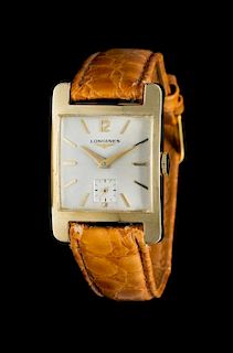 A 14 Karat Yellow Gold Wristwatch, Longines, Circa 1950,