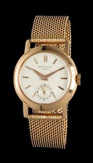 An 18 Karat Rose Gold Ref. 2455 Wristwatch, Patek Philippe, Circa 1945,