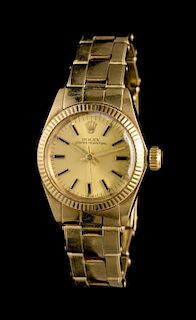 A 14 Karat Yellow Gold Ref. 6719 Oyster Perpetual Wristwatch, Rolex,