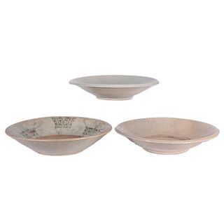 Three Chinese Ming porcelain celadon plates.