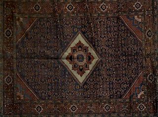 A Northwest Persian Wool Rug, 4 feet 10 inches x 6 feet 11 inches.