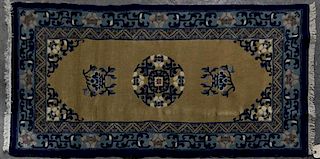 A Chinese Wool Rug, 2 feet 4 inches x 4 feet 6 inches.