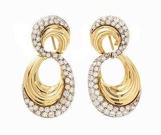 A Pair of 18 Karat Yellow Gold and Diamond Earclips, 21.00 dwts.