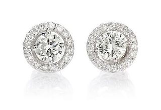 A Pair of White Gold and Diamond Earrings, 2.70 dwts.