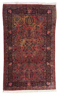 A Sarouk Wool Rug, 4 feet 9 inches x 7 feet 4 inches.