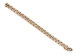 * A 14 Karat Yellow Gold Fancy Curb Link Bracelet, Tiffany & Co., 32.40 dwts.