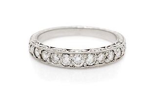 * A Platinum and Diamond Eternity Band, 3.20 dwts.