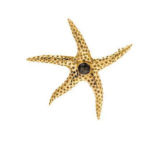 An 18 Karat Yellow Gold and Black Star Sapphire Starfish Brooch, 7.70 dwts.