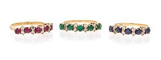 A Collection of 14 Karat Yellow Gold, Diamond and Gem Rings, 2.90 dwts.