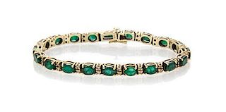 A 14 Karat Yellow Gold, Emerald and Diamond Bracelet, 11.00 dwts.