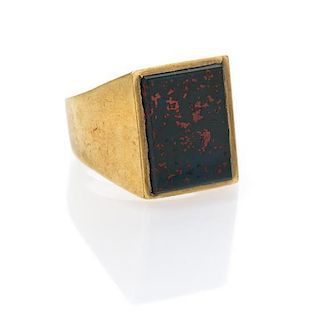 A 9 Karat Yellow Gold and Bloodstone Ring, 8.10 dwts.