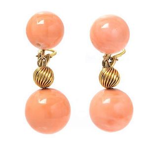 A Pair of Yellow Gold and Coral Earclips, 16.60 dwts.