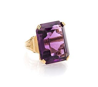 A 14 Karat Yellow Gold and Amethyst Ring, 12.50 dwts.