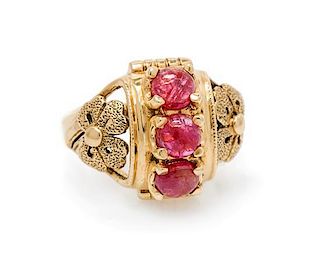 A 14 Karat Yellow Gold, Ruby and Spinel Ring, 4.10 dwts.