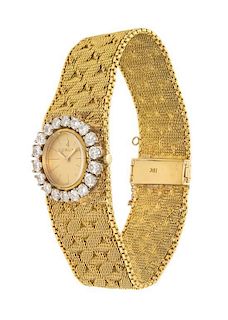 An 18 Karat Yellow Gold and Diamond Wristwatch, Corum, 35.50 dwts.