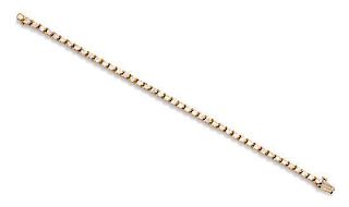 A 14 Karat Yellow Gold and Diamond Line Bracelet, 6.20 dwts.