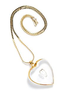 An 18 Karat Yellow Gold and Crystal Heart Pendant, Eric Hilton for Steuben Glass, 64.50 dwts.
