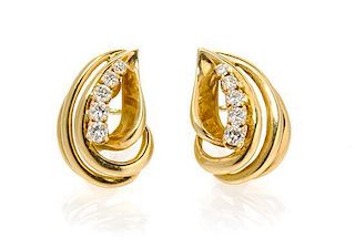 A Pair of 18 Karat Yellow Gold and Diamond Earclips, 8.50 dwts.