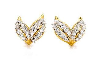 * A Pair of Yellow Gold and Diamond Earclips, 3.90 dwts.