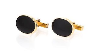 A Pair of 14 Karat Yellow Gold and Onyx Cufflinks, Tiffany & Co., 9.10 dwts.