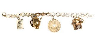 A 14 Karat Yellow Gold Charm Bracelet and Set of Charms, 19.90 dwts.